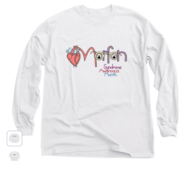 A white long-sleeve shirt with a hand drawn design saying Marfan Syndrome Awareness Month and an anatomical heart.