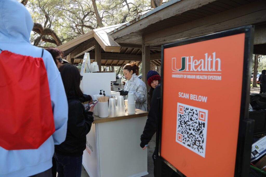 University of Miami Health distributes hot drinks amid the chilly temperatures at the Marfan Foundation's South Florida Walk for Victory
