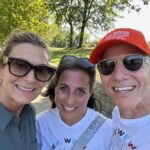 Becky and Alan Braverman with Meredith Mischner at a Walk for Victory in St. Louis. All are dressed in walk tees or casual attire and smiling in an outdoor setting.