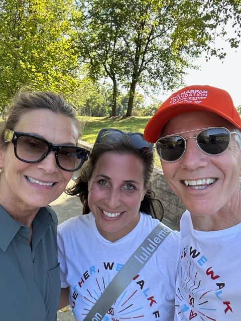 Long-time volunteers the Bravermans and staff person Meredith Mischner.