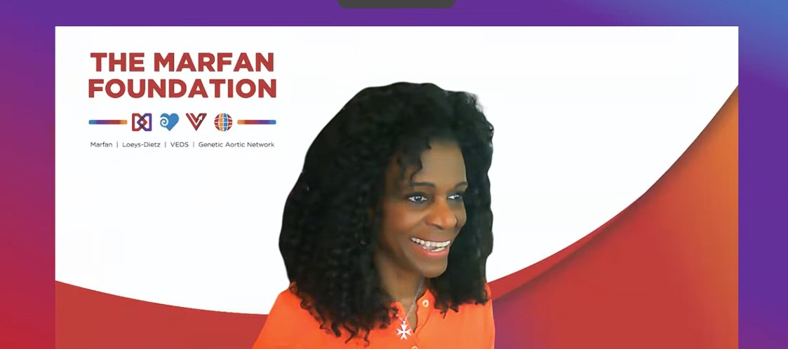 Healthy smiles session of Global Virtual Conference. Dr. Enid Neptune is pictured via Zoom with Marfan logo.