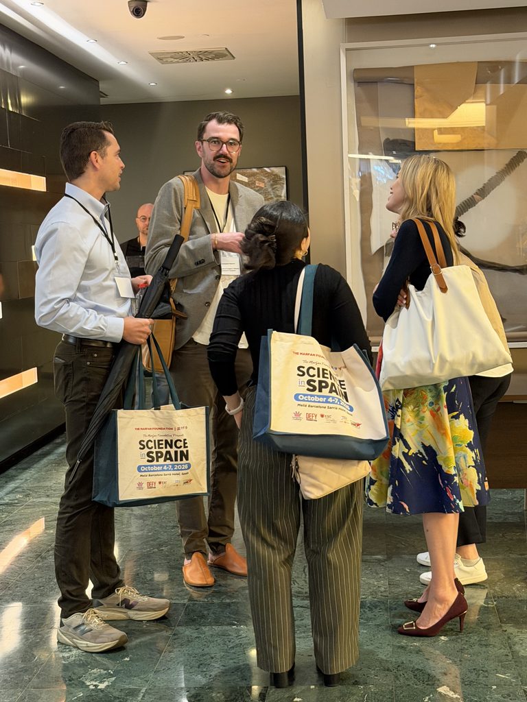 Scientists and clinicians chat at the Marfan Foundation's Science in Spain. The opportunity to informally collaborate can lead to advancing science.